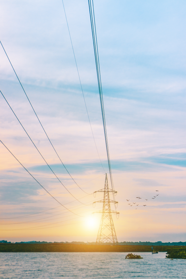 electric-transmission-tower-sunset-view