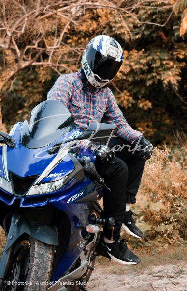 rider-wearing-helmet-blue-bike