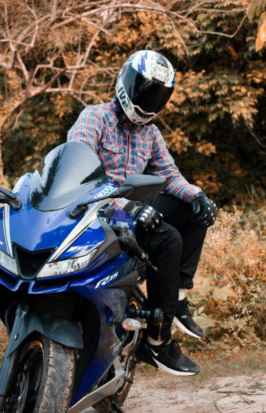 rider-wearing-helmet-blue-bike