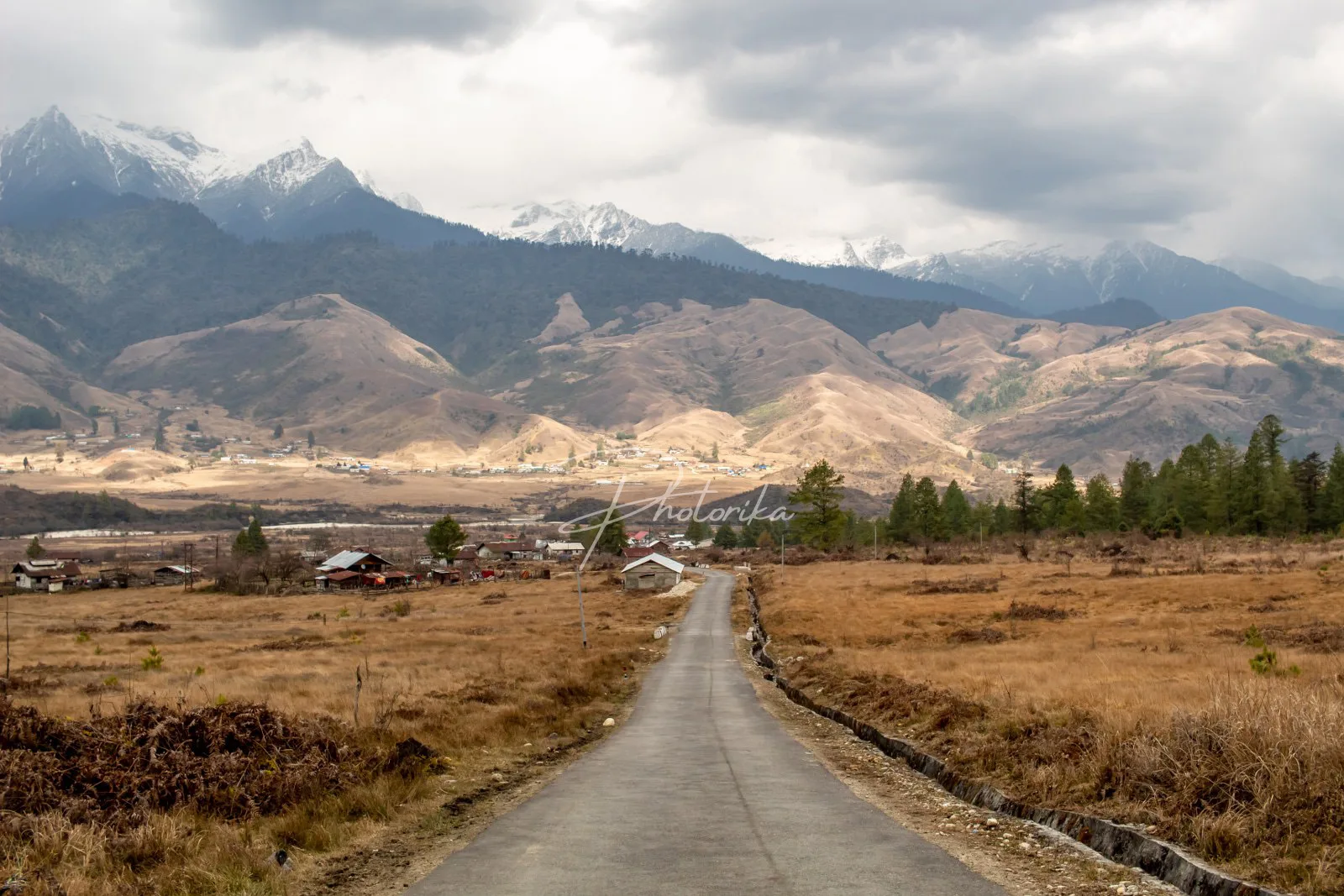 road-towards-the-town-surrounded-by-mountains