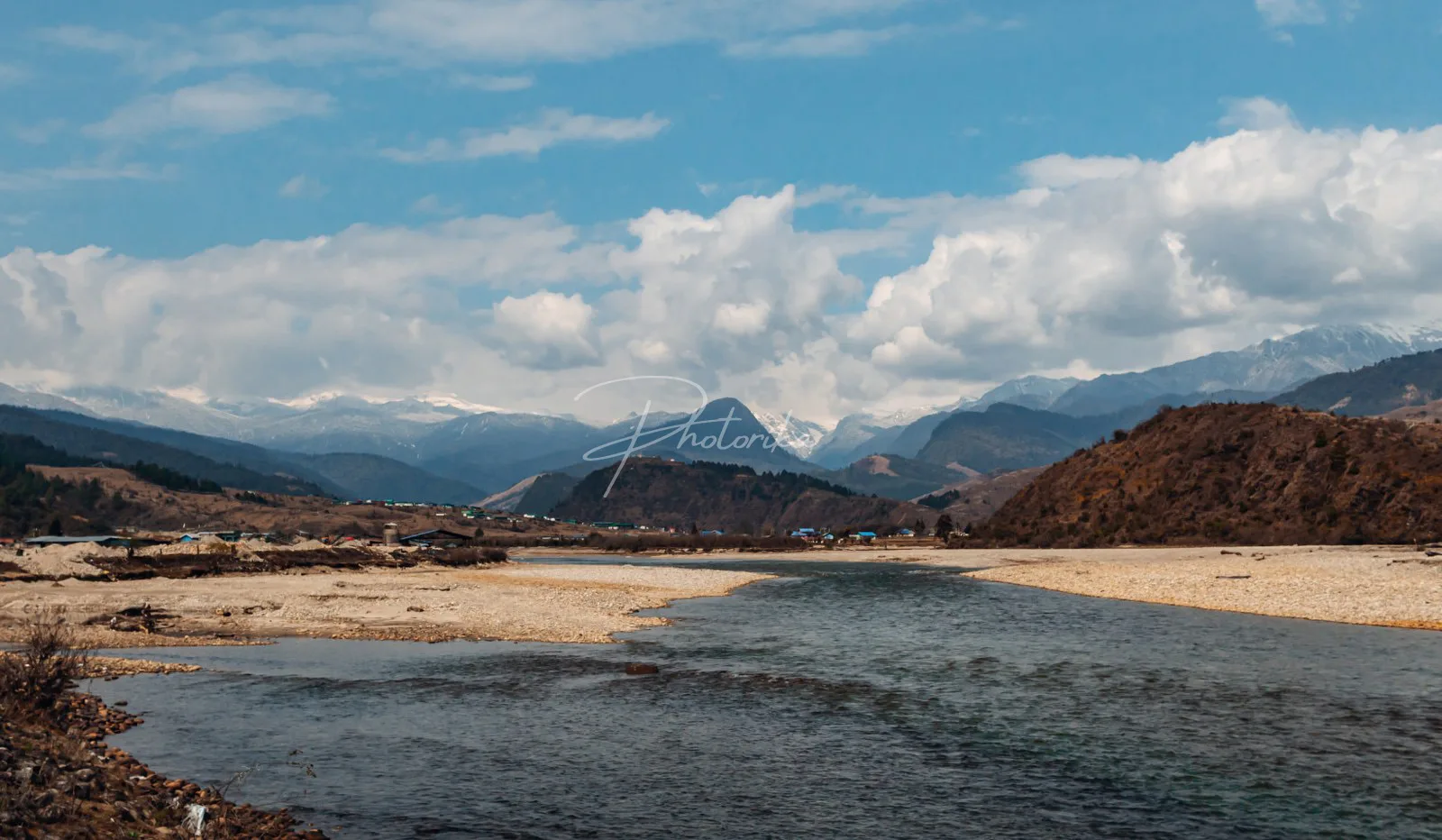 river-through-the-mountains-blue-sky